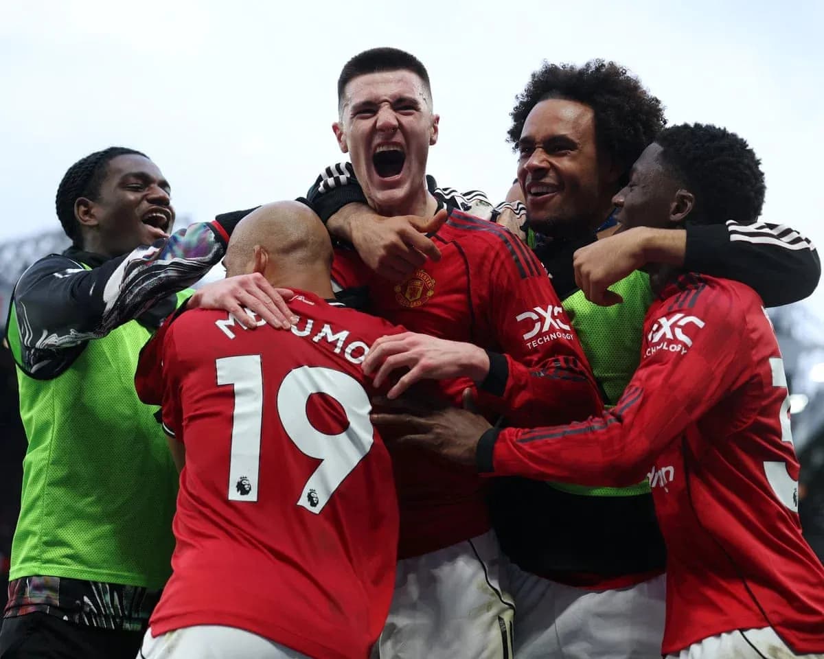 Manchester United players celebrating a goal