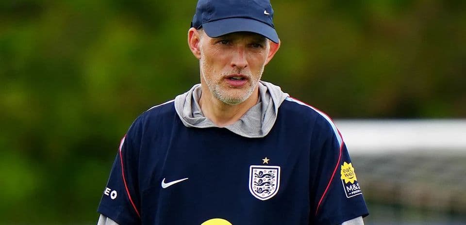 Football coach during training session outdoors