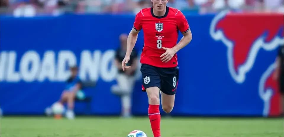 Player running with ball during a soccer match