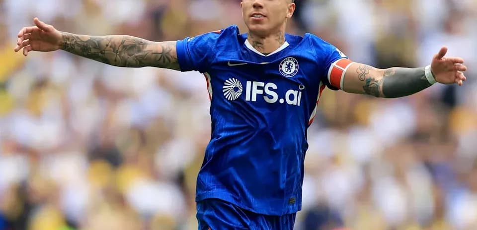 Player celebrating in Chelsea's blue kit during match