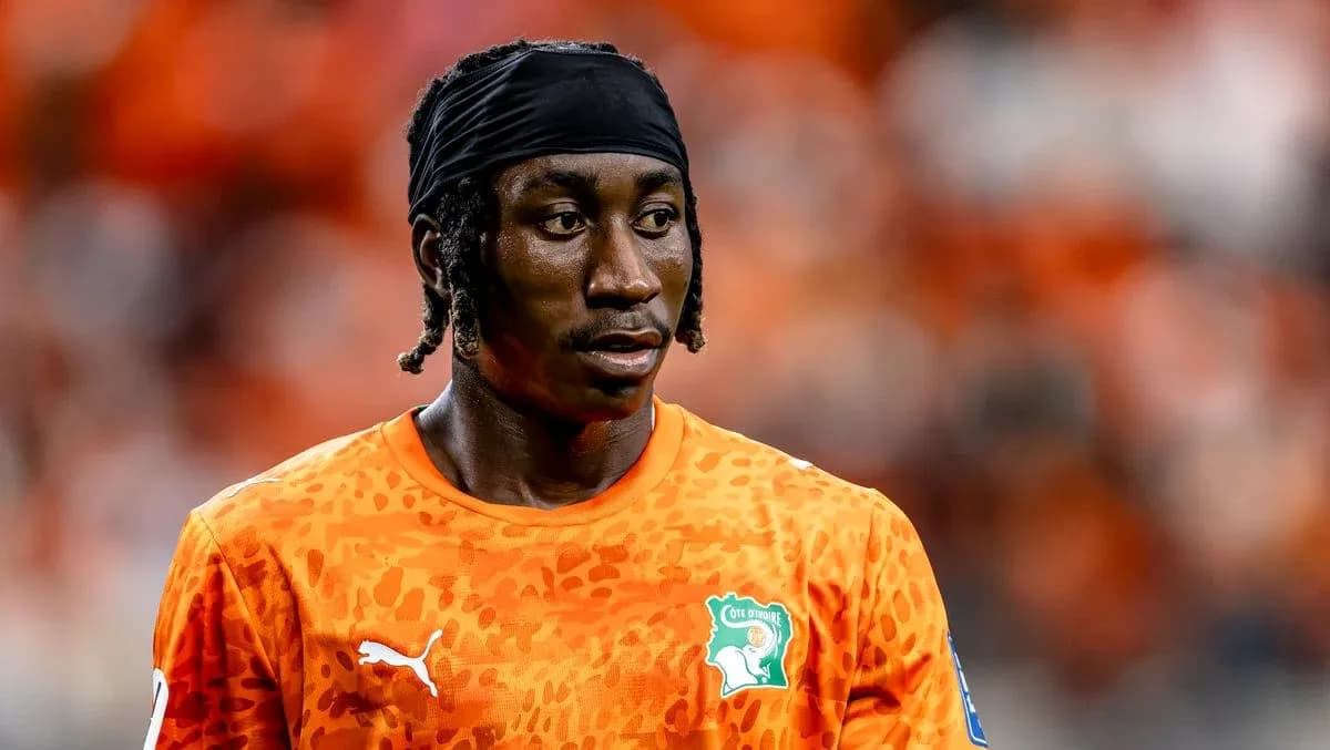 Player wearing orange jersey during a match