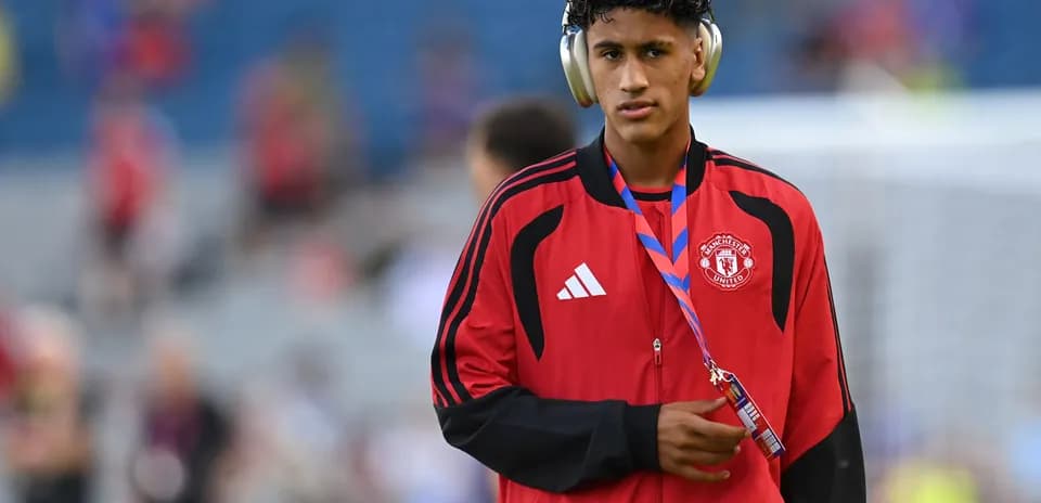 Player wearing headphones before the match