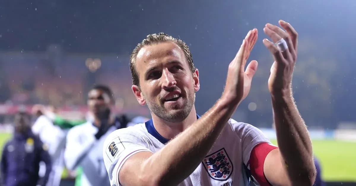 Player applauding fans after a match