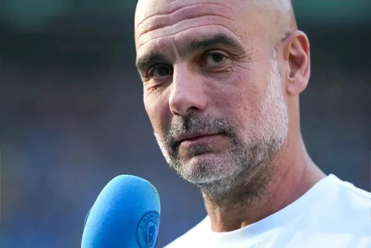 Manager speaking into microphone during interview