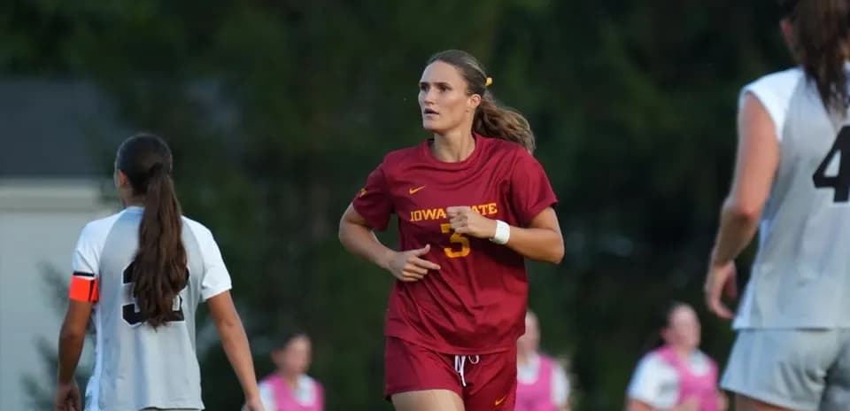 Iowa State player running during soccer match