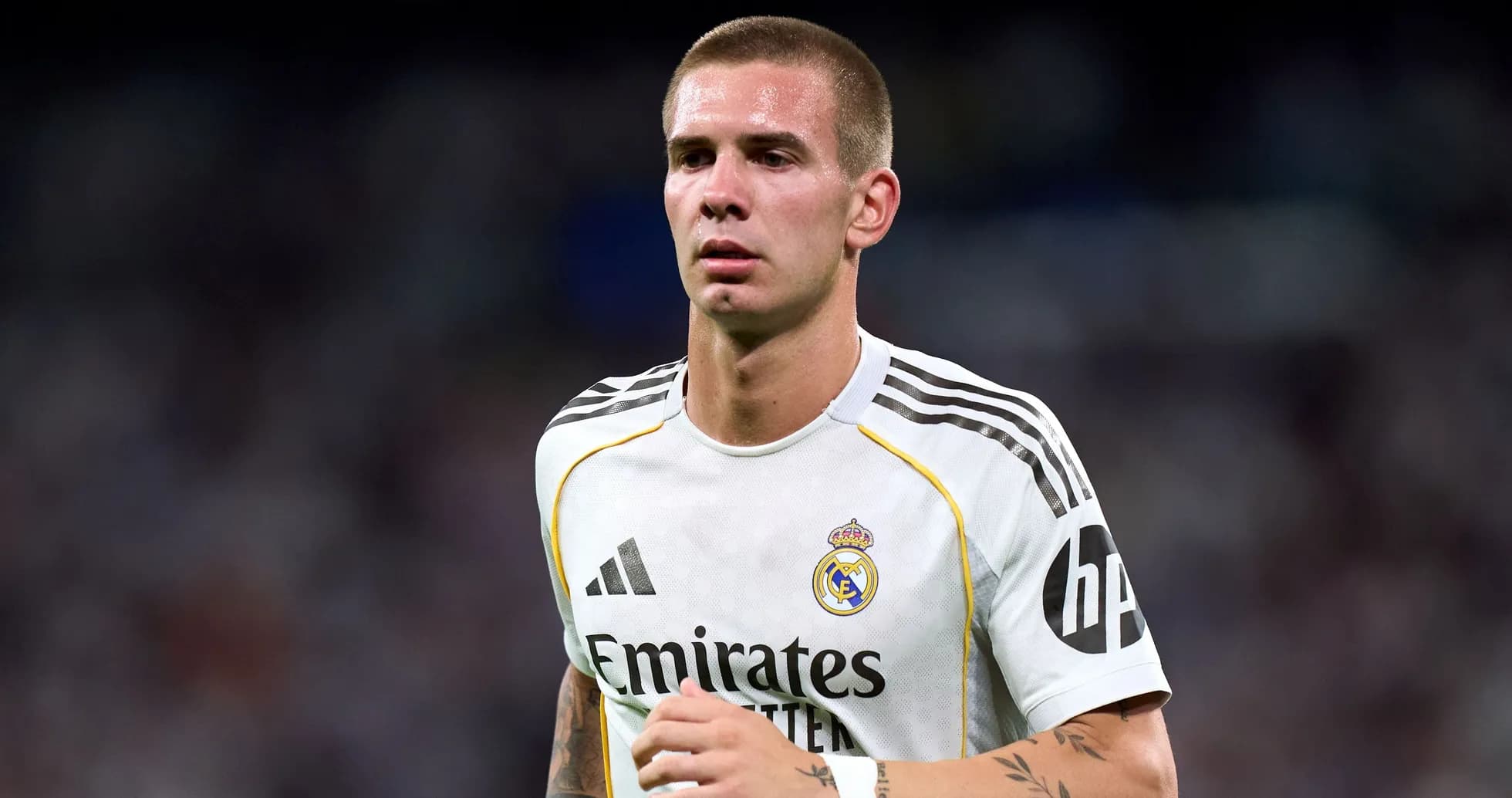 Player in Real Madrid jersey on the field