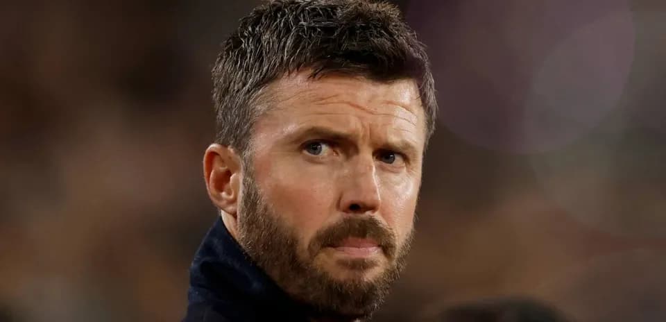Coach observing during a football match