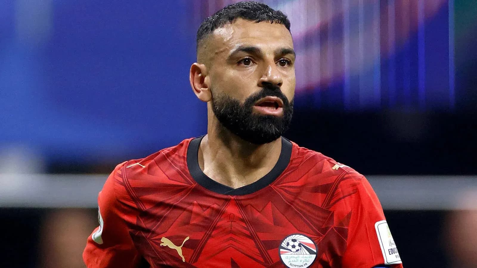 Player in red jersey during a football match