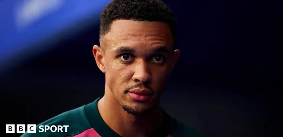 Player posing for portrait in training kit