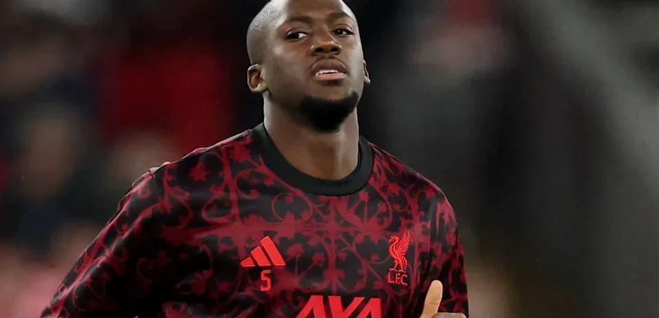 Player in Liverpool jersey warming up before match