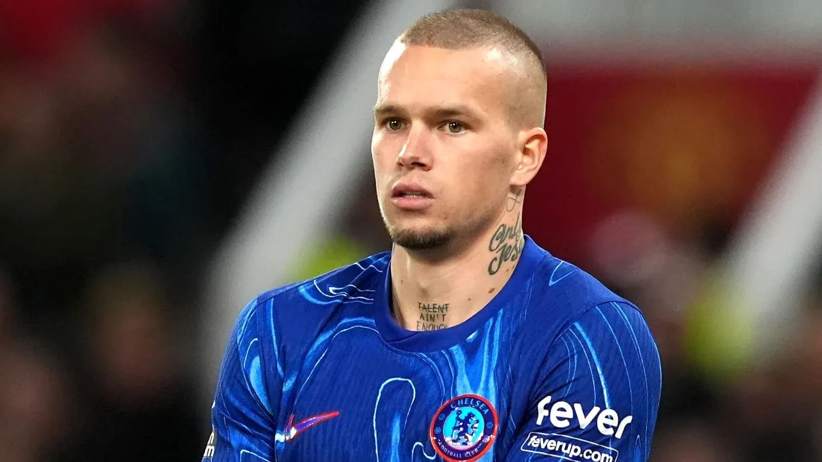 Chelsea player in blue kit during match