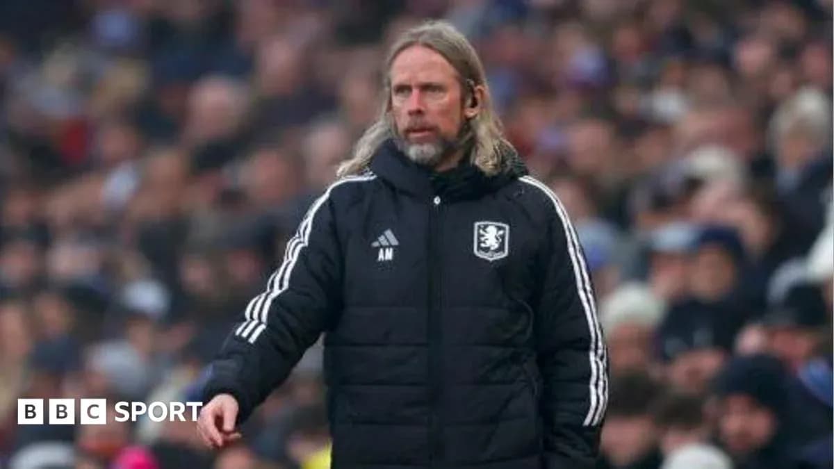 Manager directing players from the sideline during match