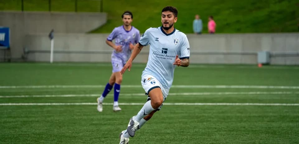 Player running during Naples vs Sarasota Paradise match