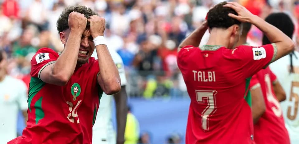 Moroccan players reacting during match with frustration