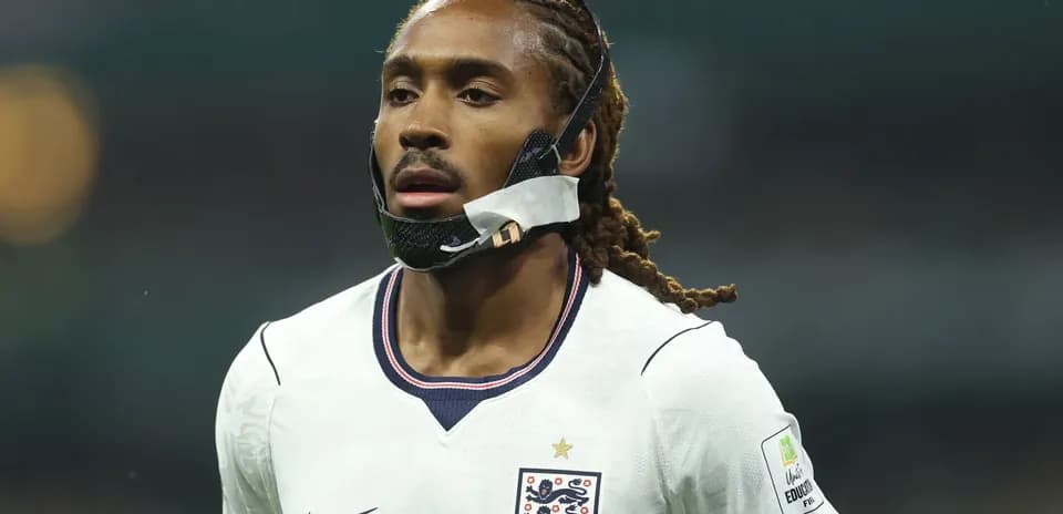 Player wearing mask during football match