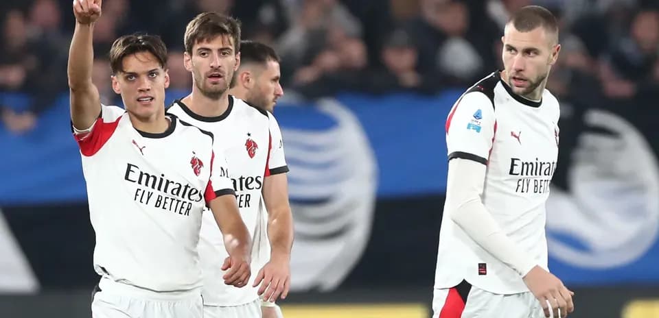 AC Milan players celebrating during Serie A match
