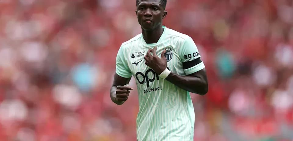 Player in mint green jersey on football field