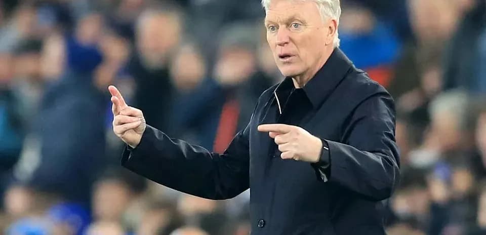 Manager giving instructions during a football match