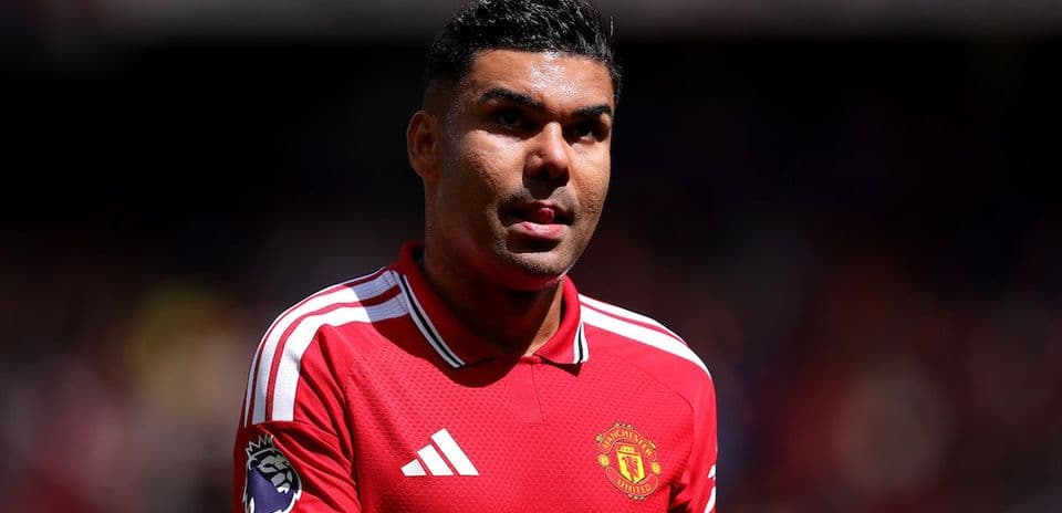 Player in Manchester United jersey on the field