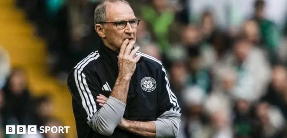 Coach observing the match from the sidelines