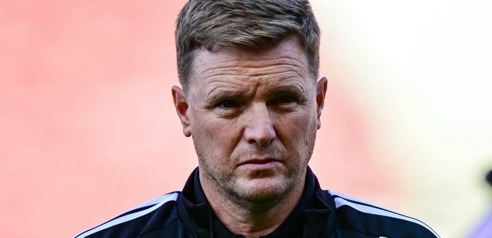 Coach standing on the sidelines before a match