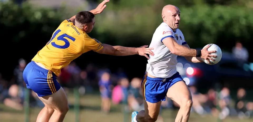 Player evading tackle while holding the ball