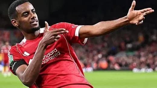Player celebrating a goal with hand gesture