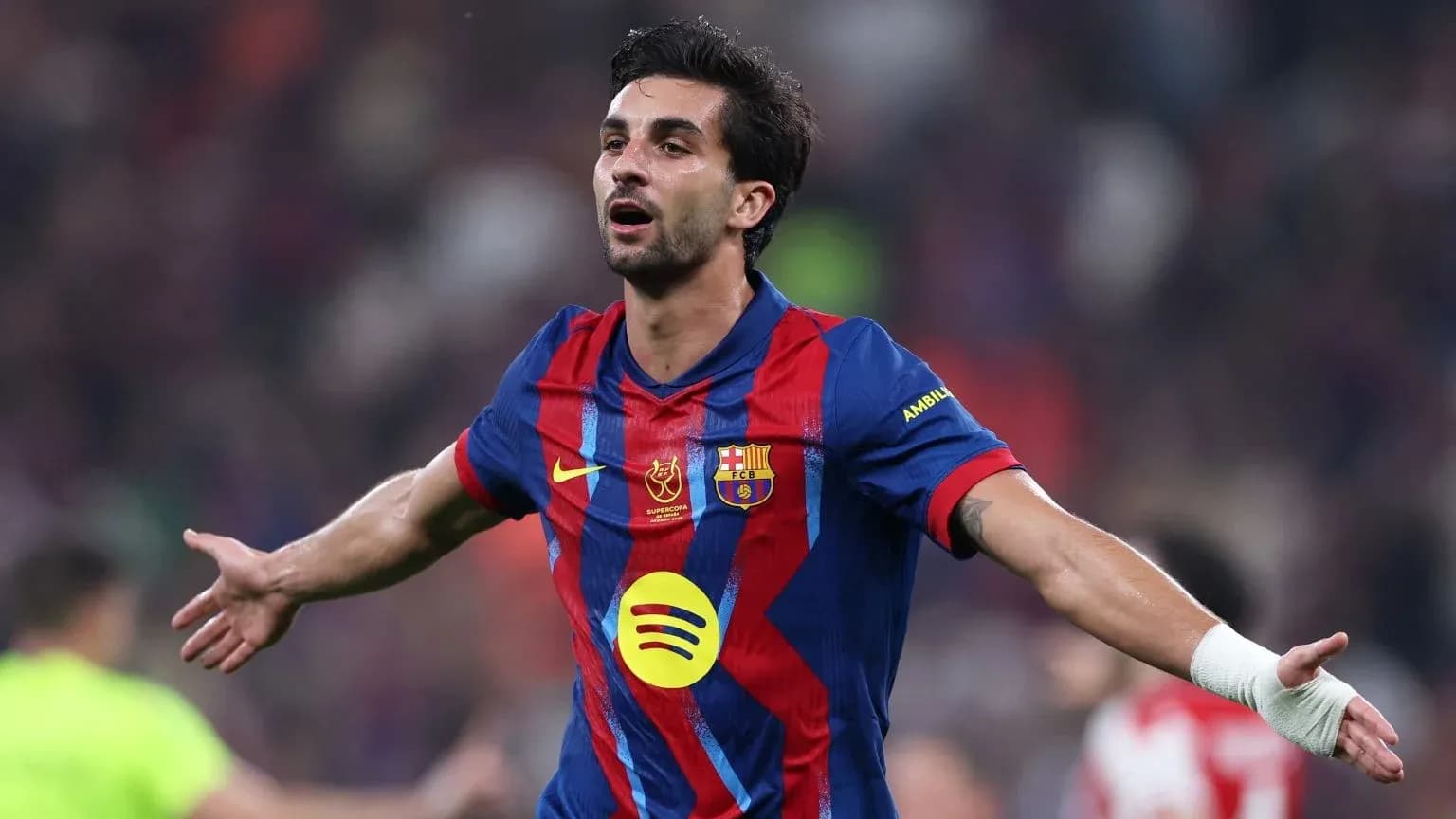 Barcelona player celebrating a goal on the pitch