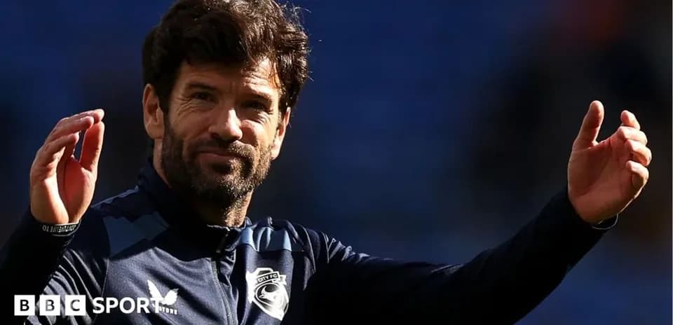 Coach gesturing during a match or training session