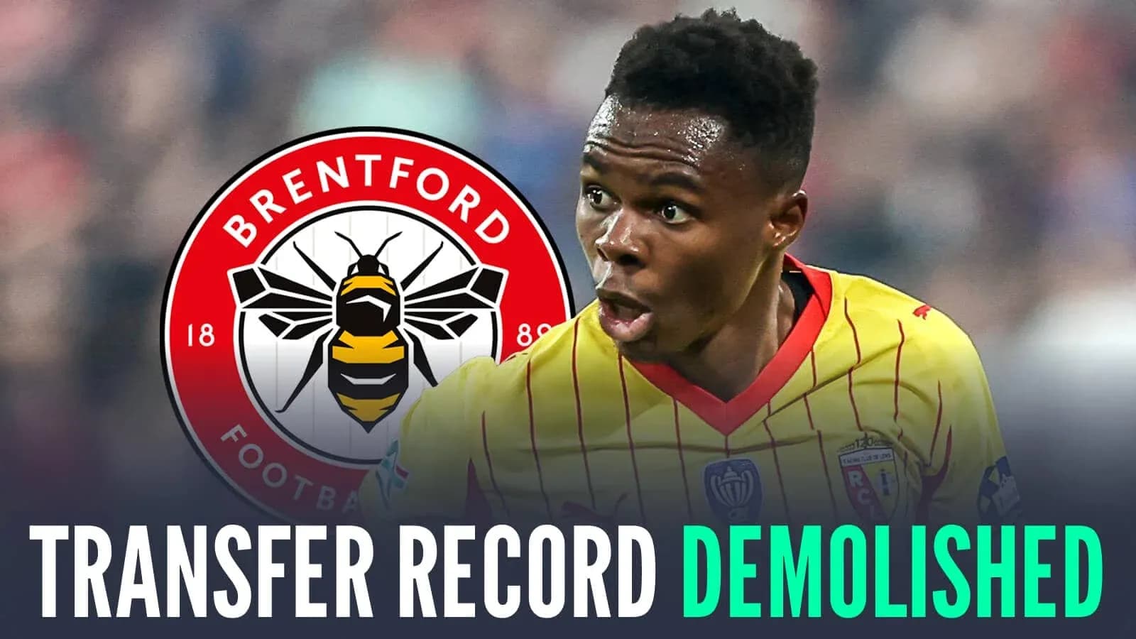 Player celebrating with Brentford logo in background