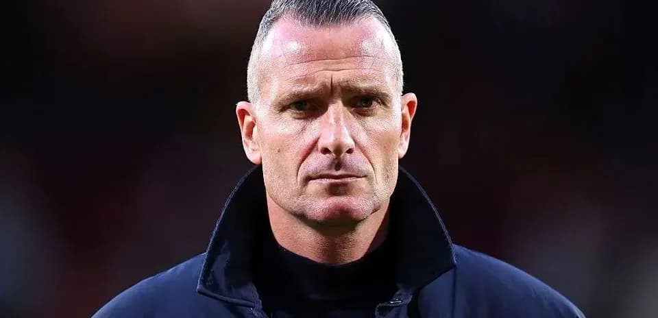Coach looking serious before a match