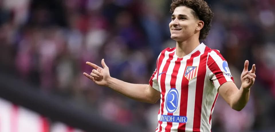 Player celebrating a goal for Atlético Madrid