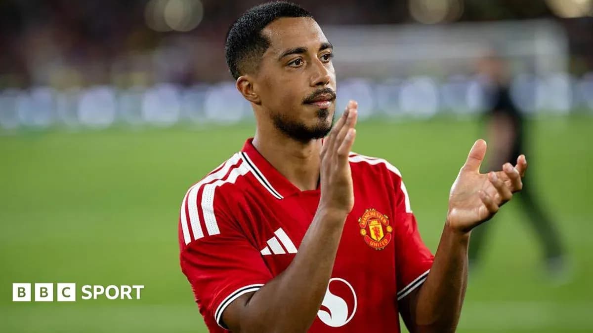 Player applauding fans after the match