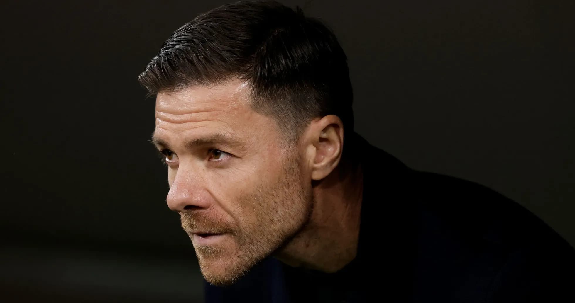 Close-up of a focused football manager during match