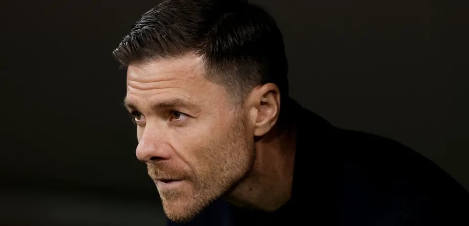 Close-up of a focused football manager during match