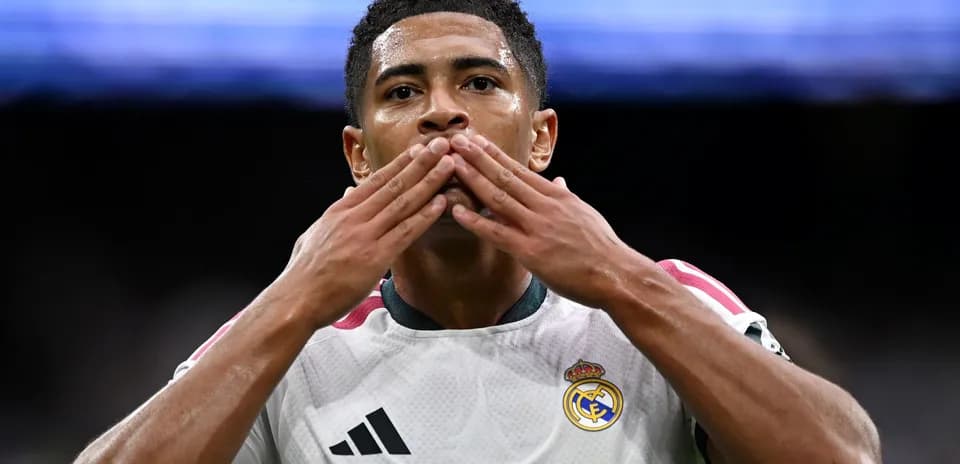 Player celebrating with hand gestures after scoring