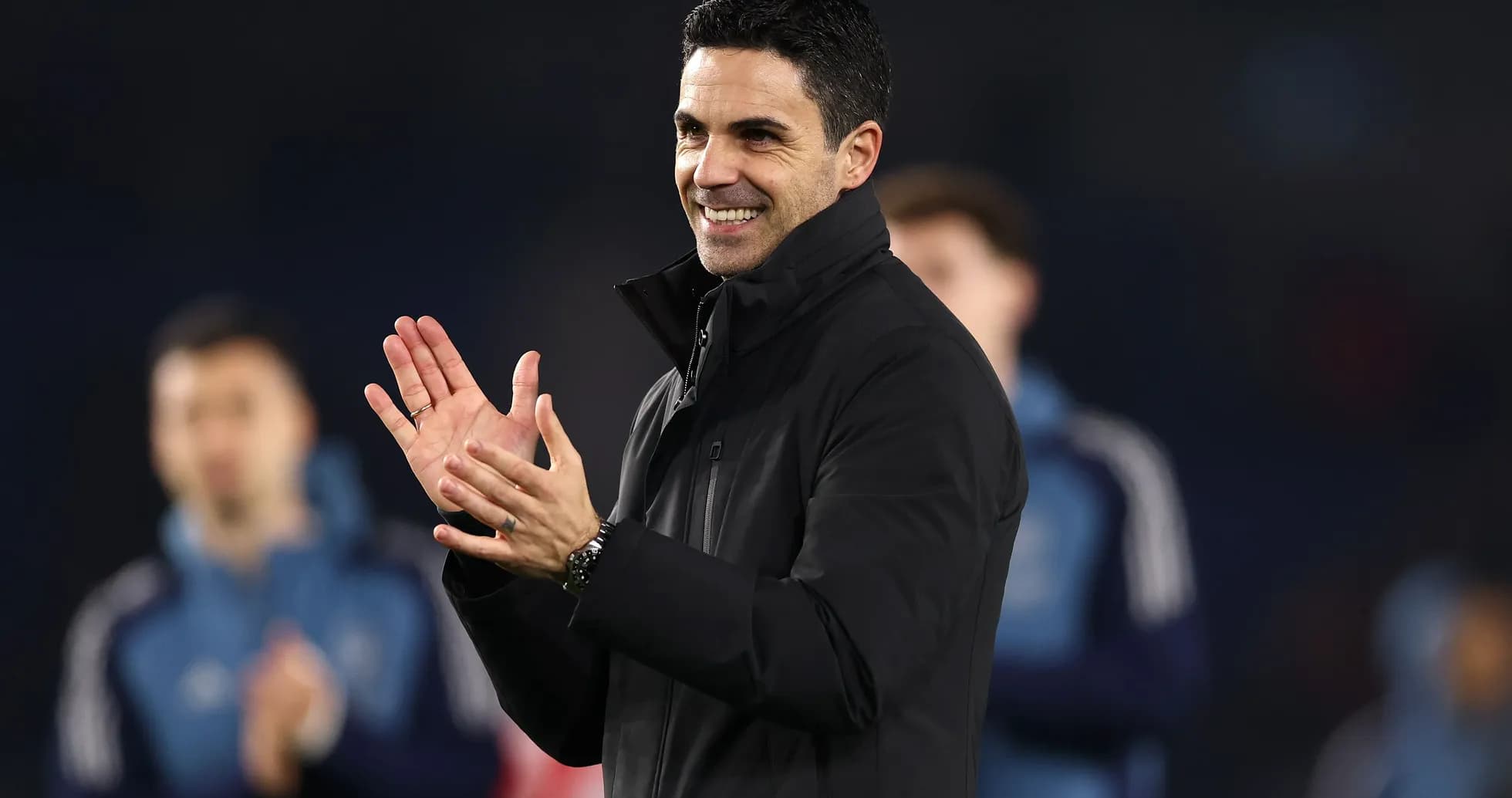 Coach applauding during a team event