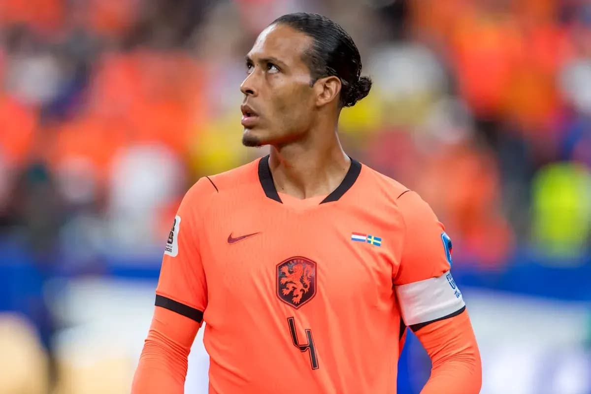 Player wearing orange jersey looking up during match