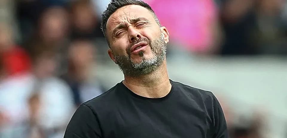 Coach reacting during a match from the sidelines