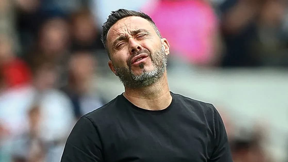 Coach reacting during a match from the sidelines