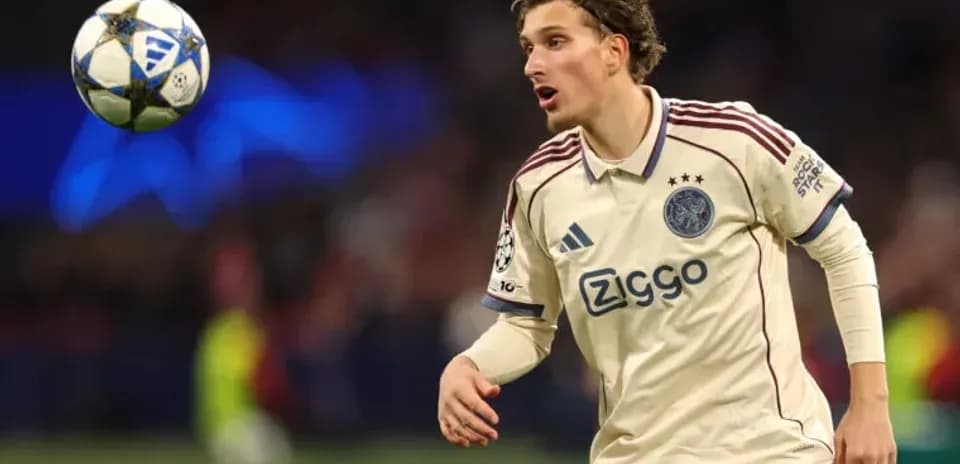 Player in Ajax kit tracking a floating ball