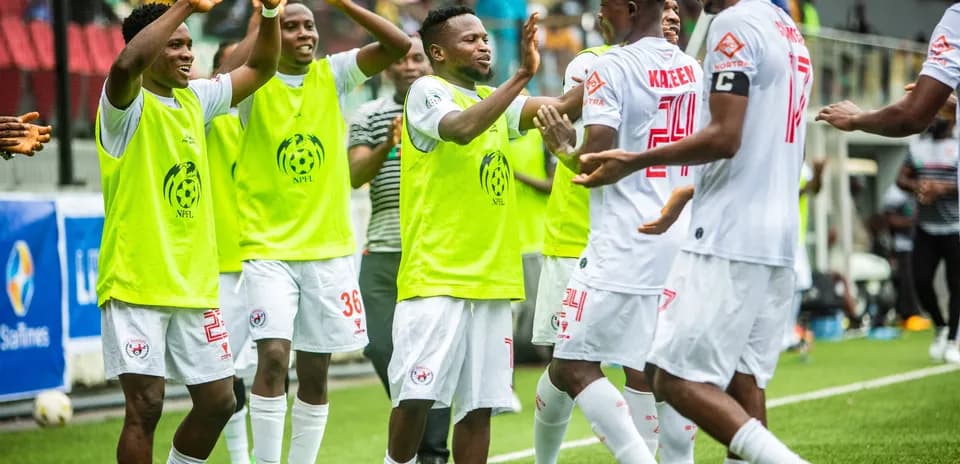 Enugu Rangers players celebrating on the pitch