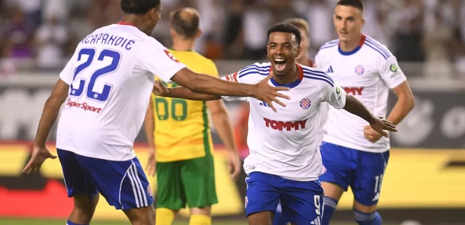 Players celebrating a goal during UEFA match