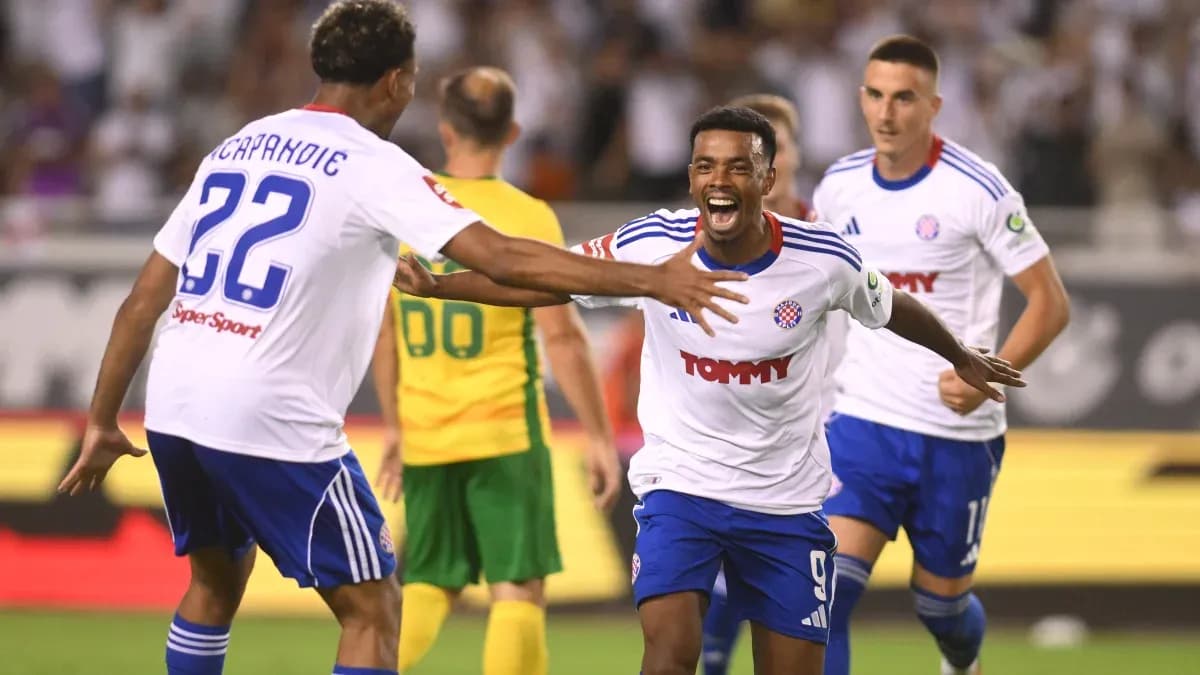 Players celebrating a goal during UEFA match