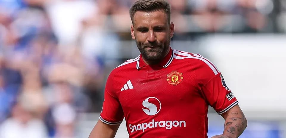 Player wearing Manchester United jersey on the field