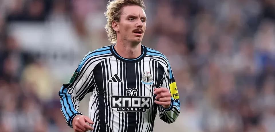 Newcastle player running during a match