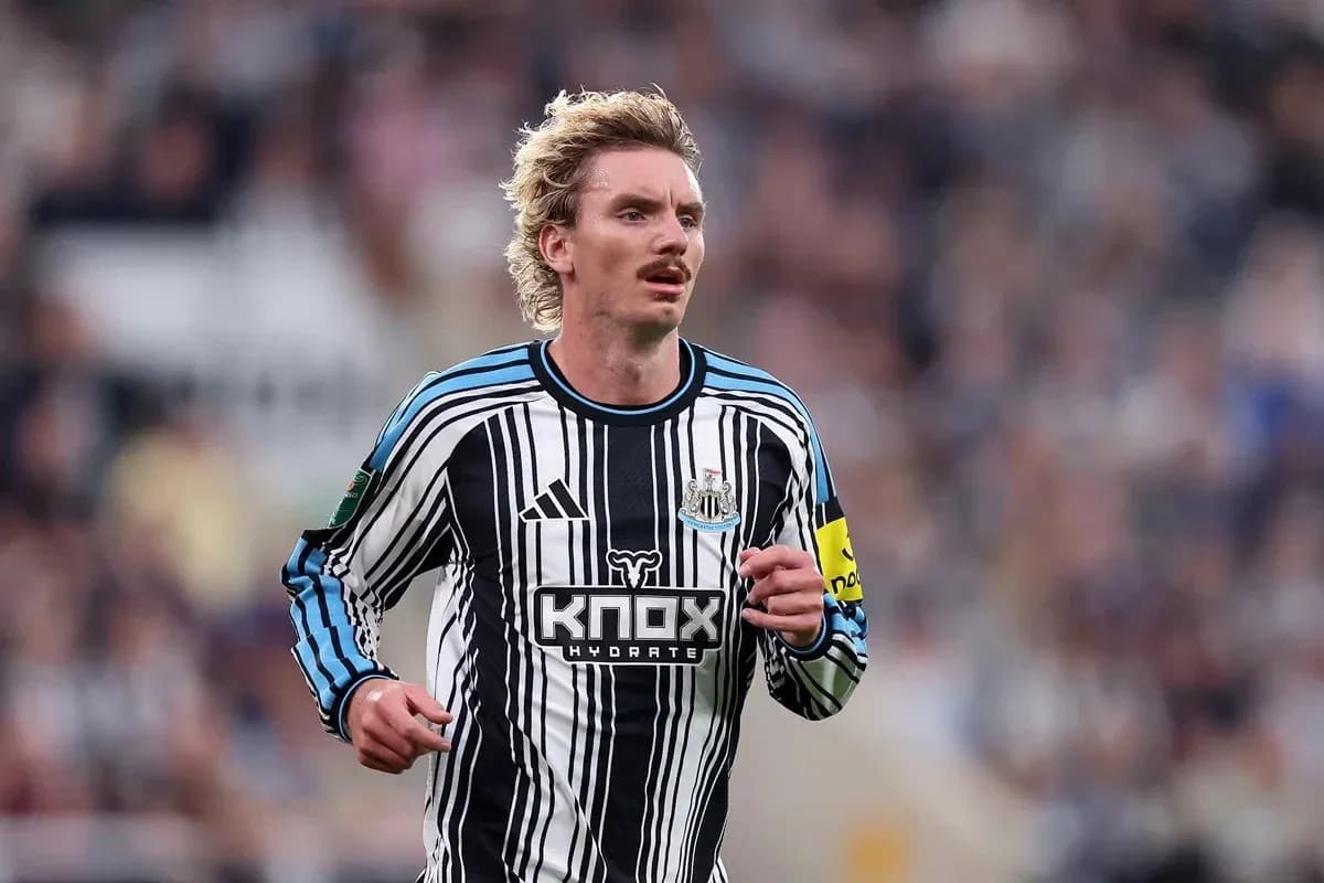 Newcastle player running during a match