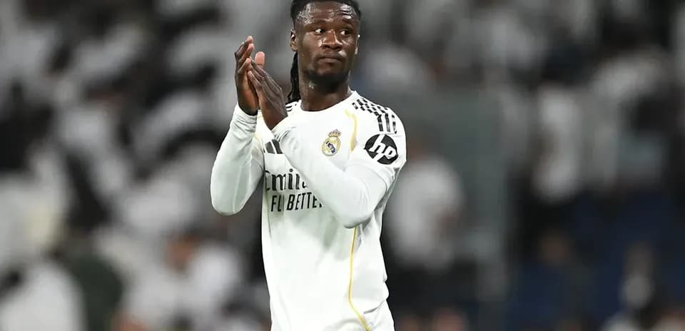 Player applauding fans during a match