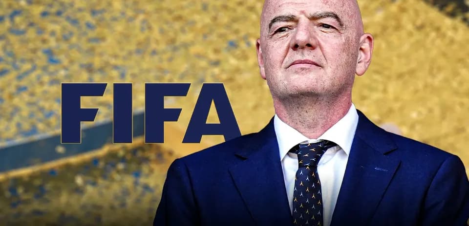 FIFA logo with official at a press event