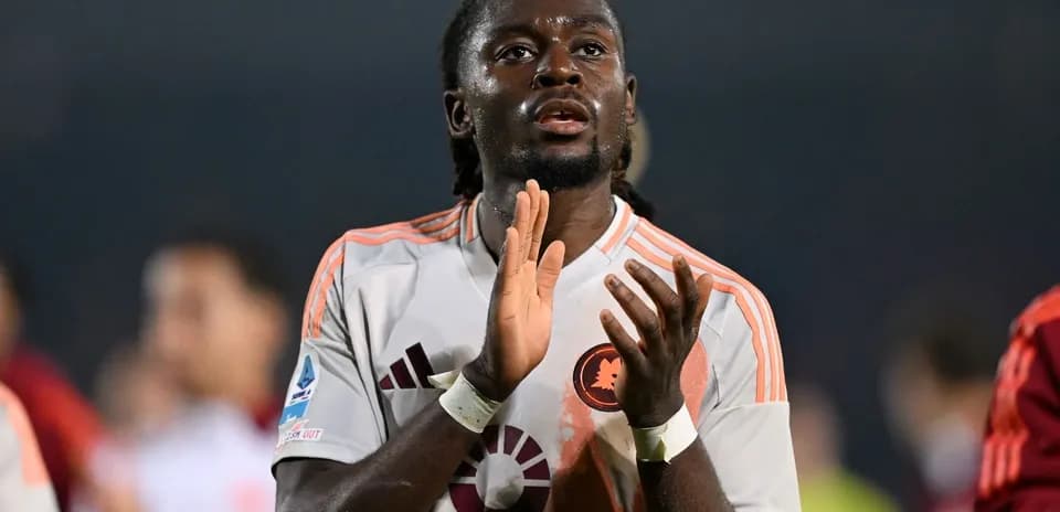 Player clapping after the match in team jersey